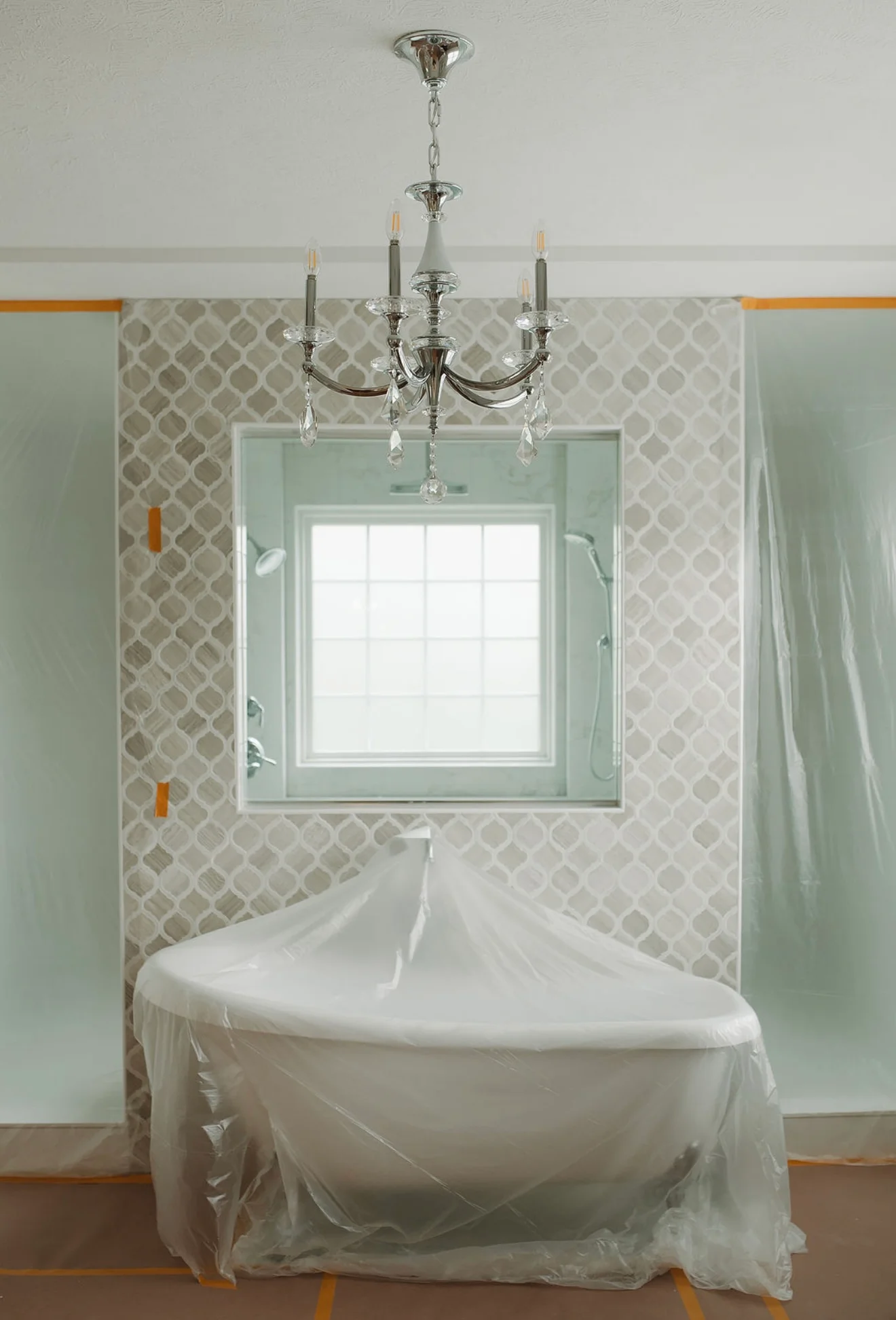 Renovated bathroom with new tile and modern fixtures
