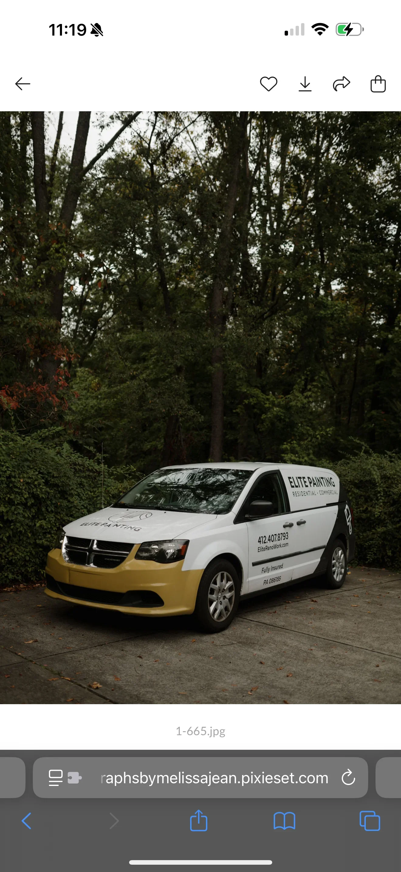 White and gold painted service van with professional lettering and branding